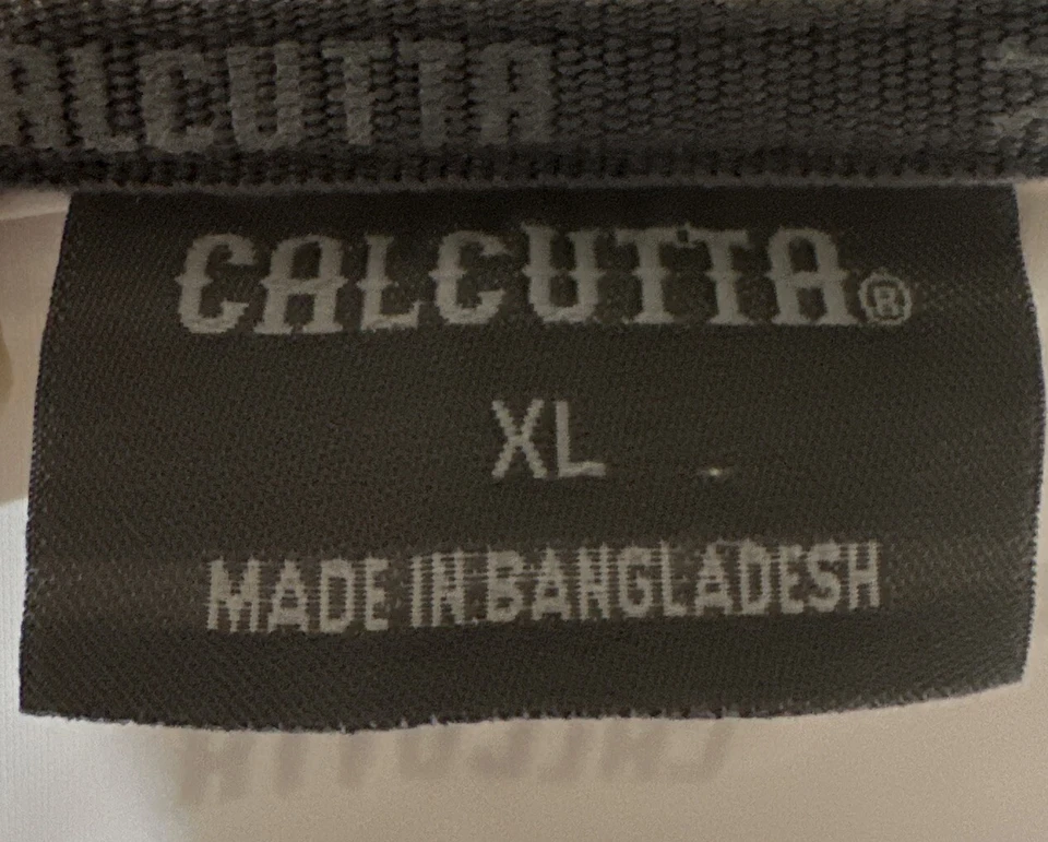 Polo de golf Calcutta XL blanco y gris ventilado manga corta para hombre Foto 4 de 4