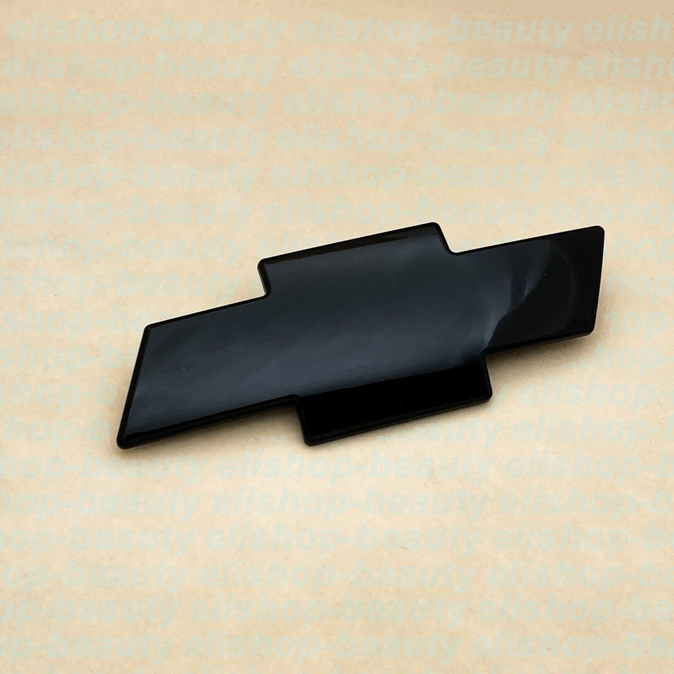 OEM 1999-02 Chevrolet Silverado 2000-06 Tahoe Suburban parrilla delantera emblema de pajarita Foto 3 de 4