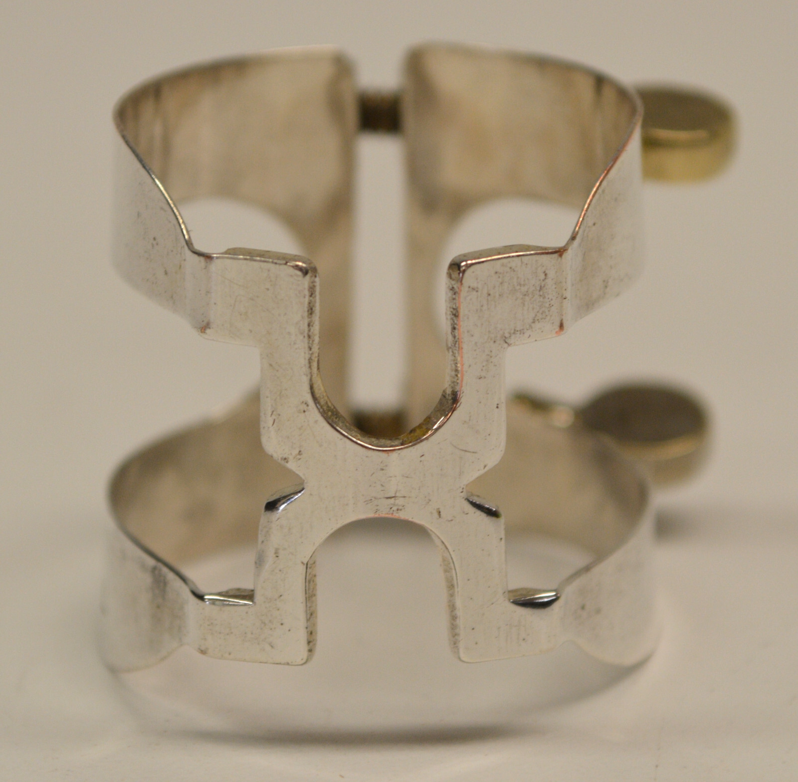 USED VINTAGE HARRISON BARI SAX LIGATURE W/PATENT REFERENCE, MARKED BSL