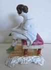 Woman Sitting on Vanity Stool Getting Dressed — photo 7