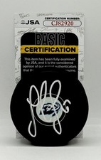 Lawson Crouse signed Utah Mammoth Logo Puck autographed JSA