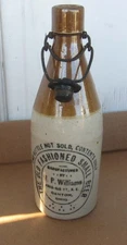 H P WILLIAMS CANTON OHIO OLD FASHIONED STONEWARE BEER BOTTLE