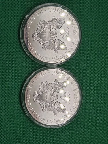 Two 2x 2012 $1 Silver American Eagles PF69 Uncirculated from mint in holders