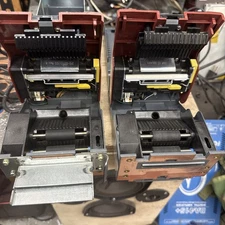 2 Futurelogic Gen 2 Universal (RS232 or USB) Ticket Printers and 1 harness 