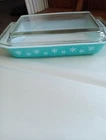 Vintage Pyrex casserole dish in the Turquoise Snowflake pattern