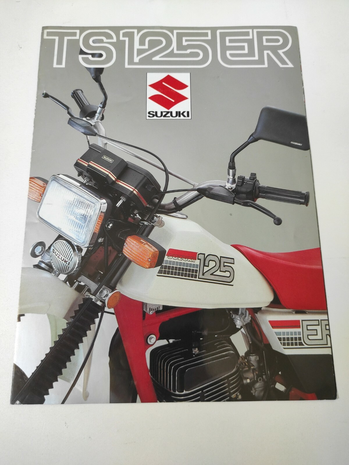 Brochure moto Suzuki TS 125 ER pour décoration garage nostalgie 1980