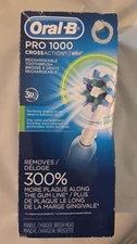 Oral-B Pro 1000 Rechargeable Electric Toothbrush Cross Action Braun WORN BOX