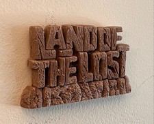 'Land of the Lost'  'Logo plaque