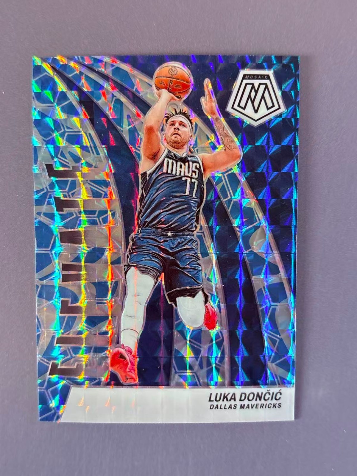 Luka Doncic 2023-24 Panini Mosaic Elevate Light Blue Prizm /99 #2