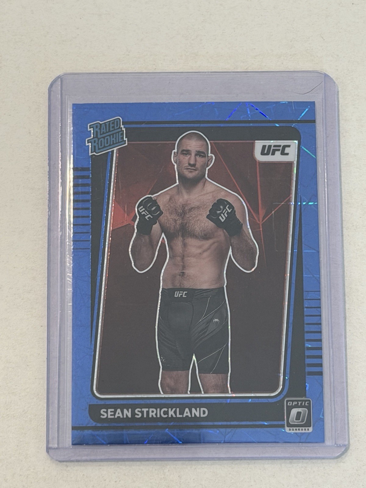 2022 Panini Donruss Optic UFC - Rated Rookie Sean Strickland #111 Blue Velocity