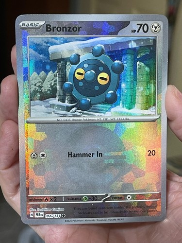 POKEMON BRONZOR #066/131 COMMON POKEBALL HOLOFOIL NM PRISMATIC EVOLUTIONS CARD