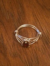 Wire wrapped ring with 6mm garnet CZ size 6.5 - 7