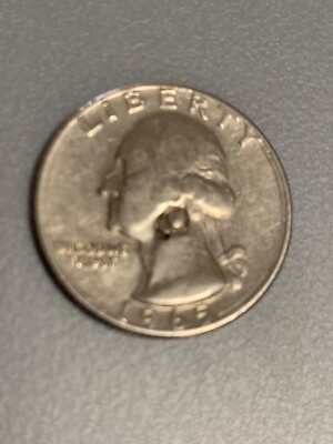 1965 Washington quarter major error, letter a struck thru back, see reverse.