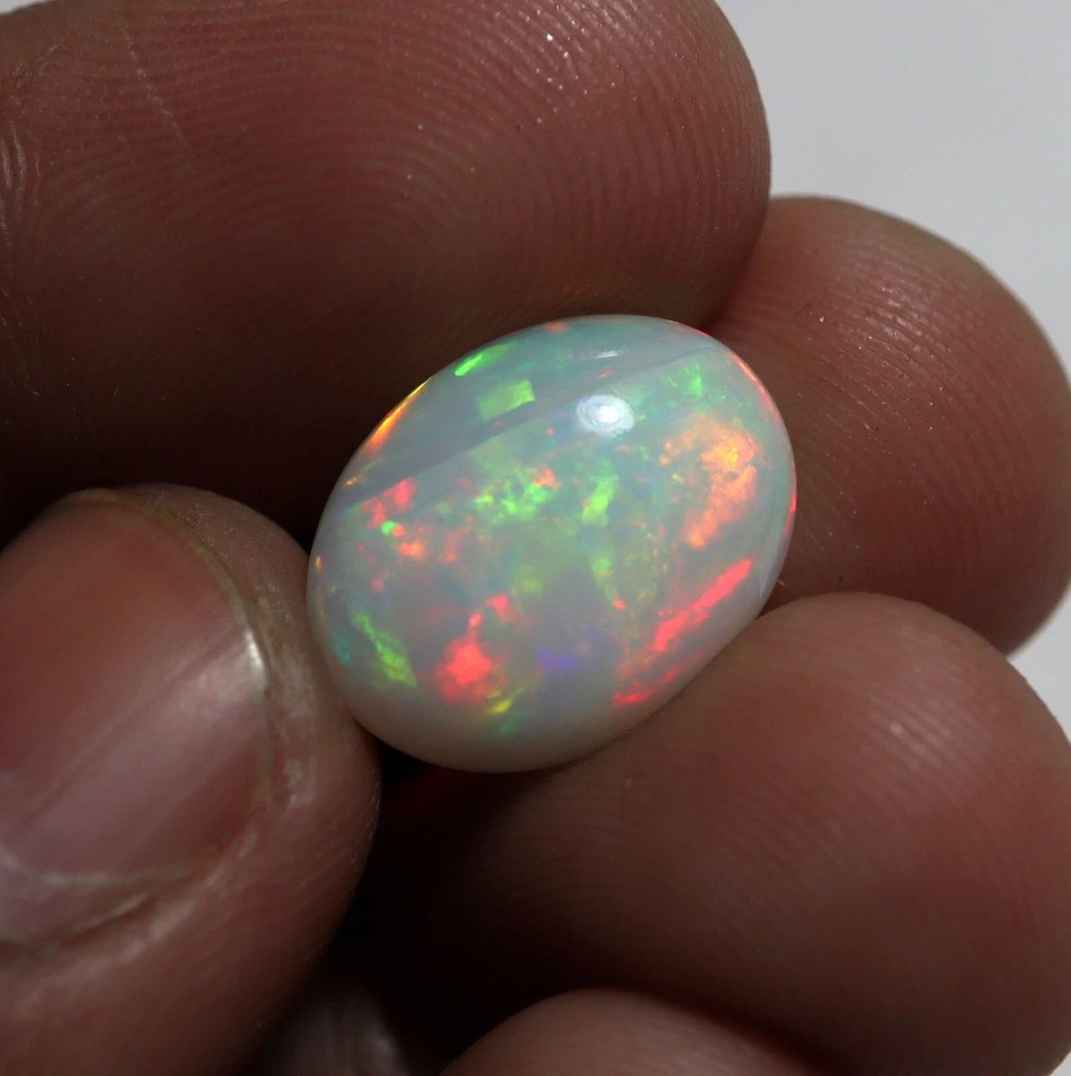 4.45 Ct 14.7x11.3 MM Natural Red Pink Yellow Blue Fire Welo Opal Oval Cabochon