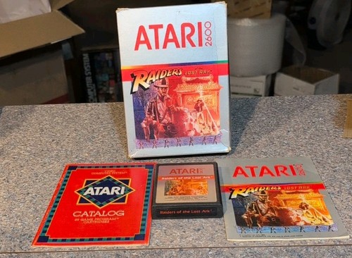 Jeu Atari 2600 Raiders Of The Lost Ark – 1ère édition EO Holo – Boîte PAL Complète Notice