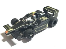AURORA AFX G + Plus F1 INDY #1 LOTUS Mario Andretti Black VALVOLINE HO Slot Car