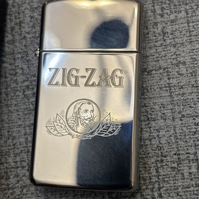 Zippo 2000 Zig-Zag Logo Sealed With Case 