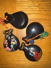 2 pairs of  castanets, one pair ornately decorated with  Flamenco Dancers