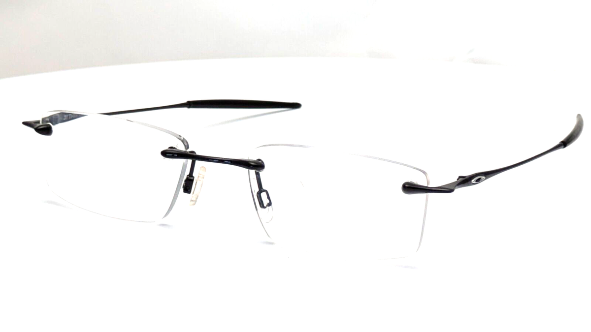 オック Oakley Thirteen OX3113-0153 Rectangle Polished Black Rimless Men