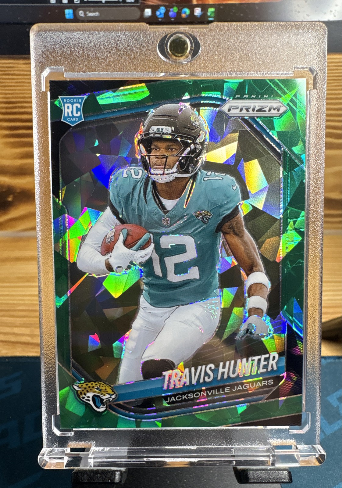 2025 Panini Prizm - Rookies Travis Hunter #301 Green Ice Prizm (RC)