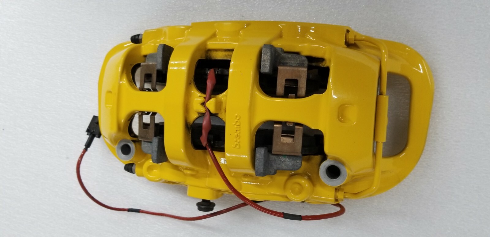 FERRARI 488 FRONT RIGHT PASSENGER CARBON CERAMIC BRAKE CALIPER YELLOW OEM 328377