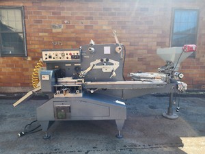 SEMCA HORIZONTAL HIGH SPEED WRAPPING MACHINE MODEL 90