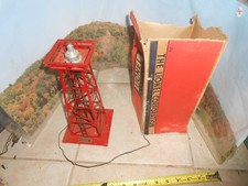 O/O-27 Lionel 394 red Spot light beacon tower in tattered box. as is.