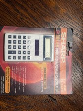 vintage Sharp Elsi Mate EL-240HB solar-powered handheld calculator fro
