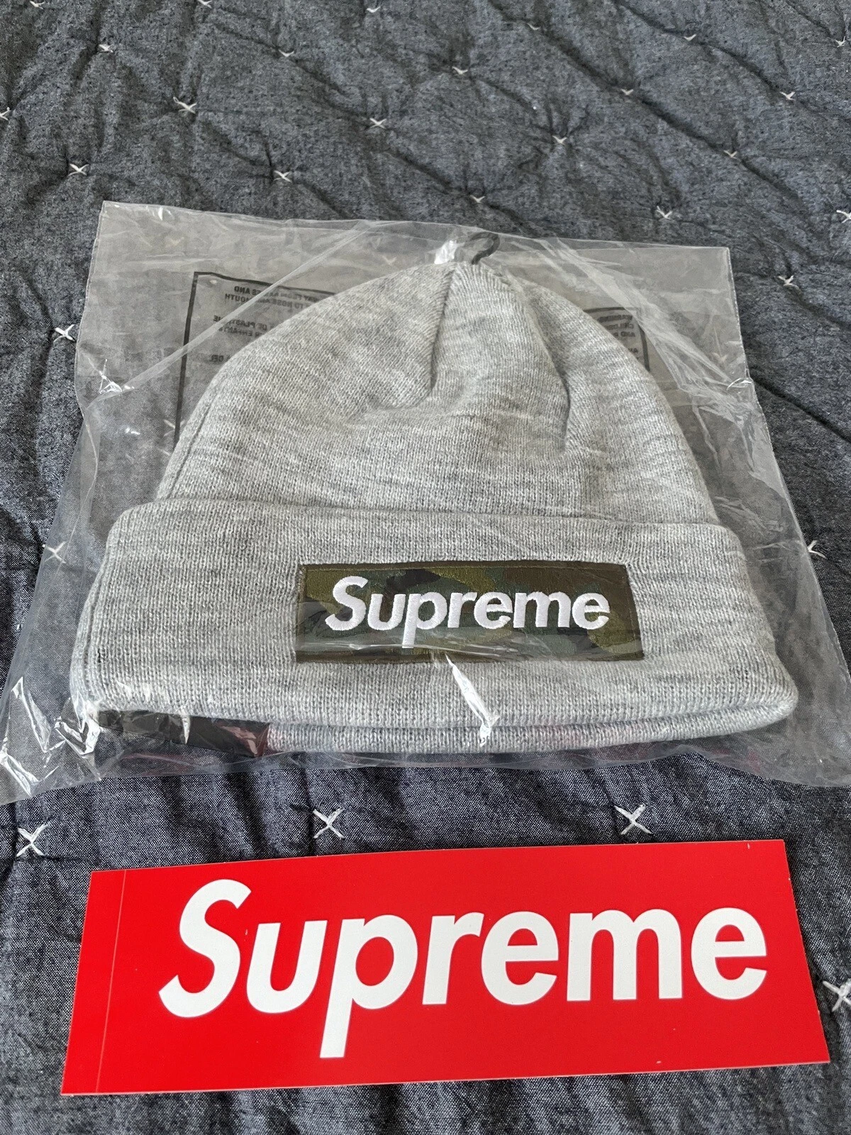 Boîte Supreme New Era logo Beanie Heather gris