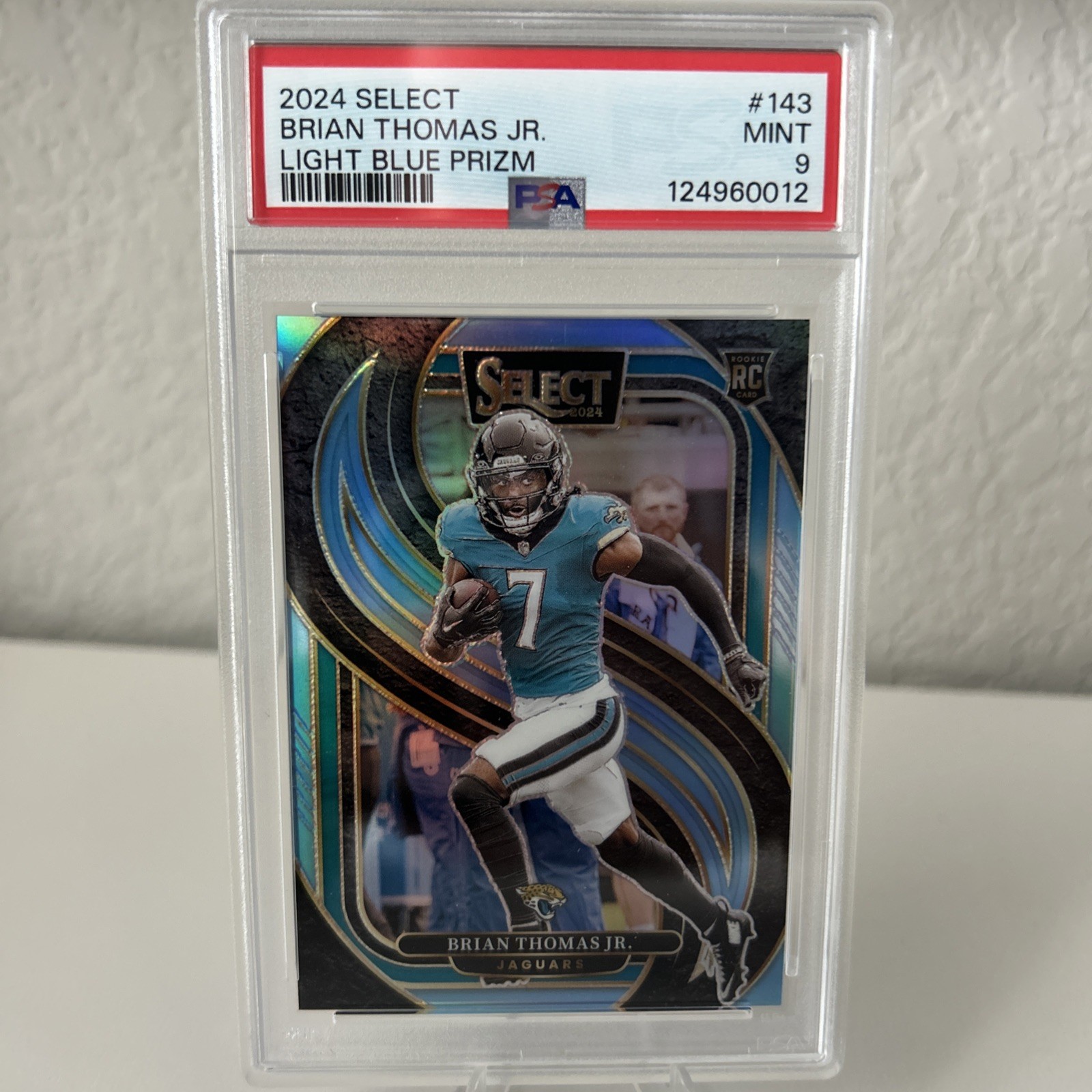 2024 Panini Select BRIAN THOMAS JR. RC LIGHT BLUE PRIZM /99 Jaguars #143 PSA 9
