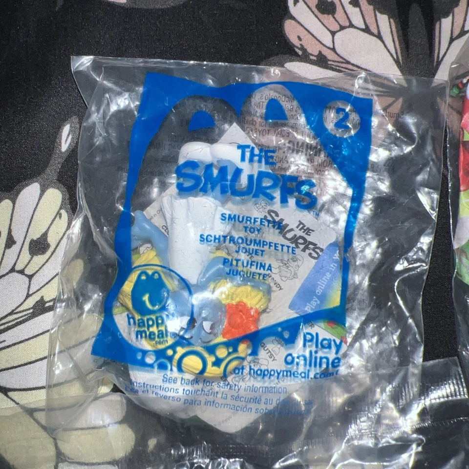 Brinquedos McDonald's 2011 Smurfs Happy Meal pacote lacrado 7 brinquedos - Imagem 2 de 4