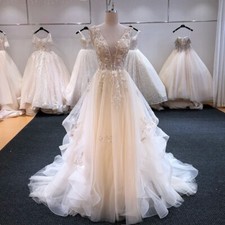 Luxury A-Line Wedding Dresses V-Neck Sleeveless Lace Applique Beaded Bridal Gown
