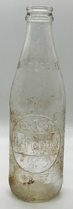 Dr Pepper Clear Glass Embossed Soda Bottle 1988. 10 FL. OZ.