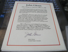 ASTRONAUT, JOHN GLENN, SIGNED (purple ink)  WHAT BEING AN AMERICAN MEANS TO ME