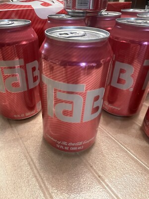 TAB soda cans 9 (8 Full 1 Empty) All Unopened. Plus Torn Cardboard Carton