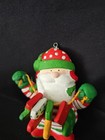 Vintage Santa Claus  Christmas Ornament 6 1/2” holding socks — photo 1