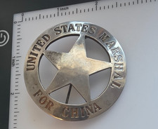 Obsolete and Historic United States Marshal For China pin back.