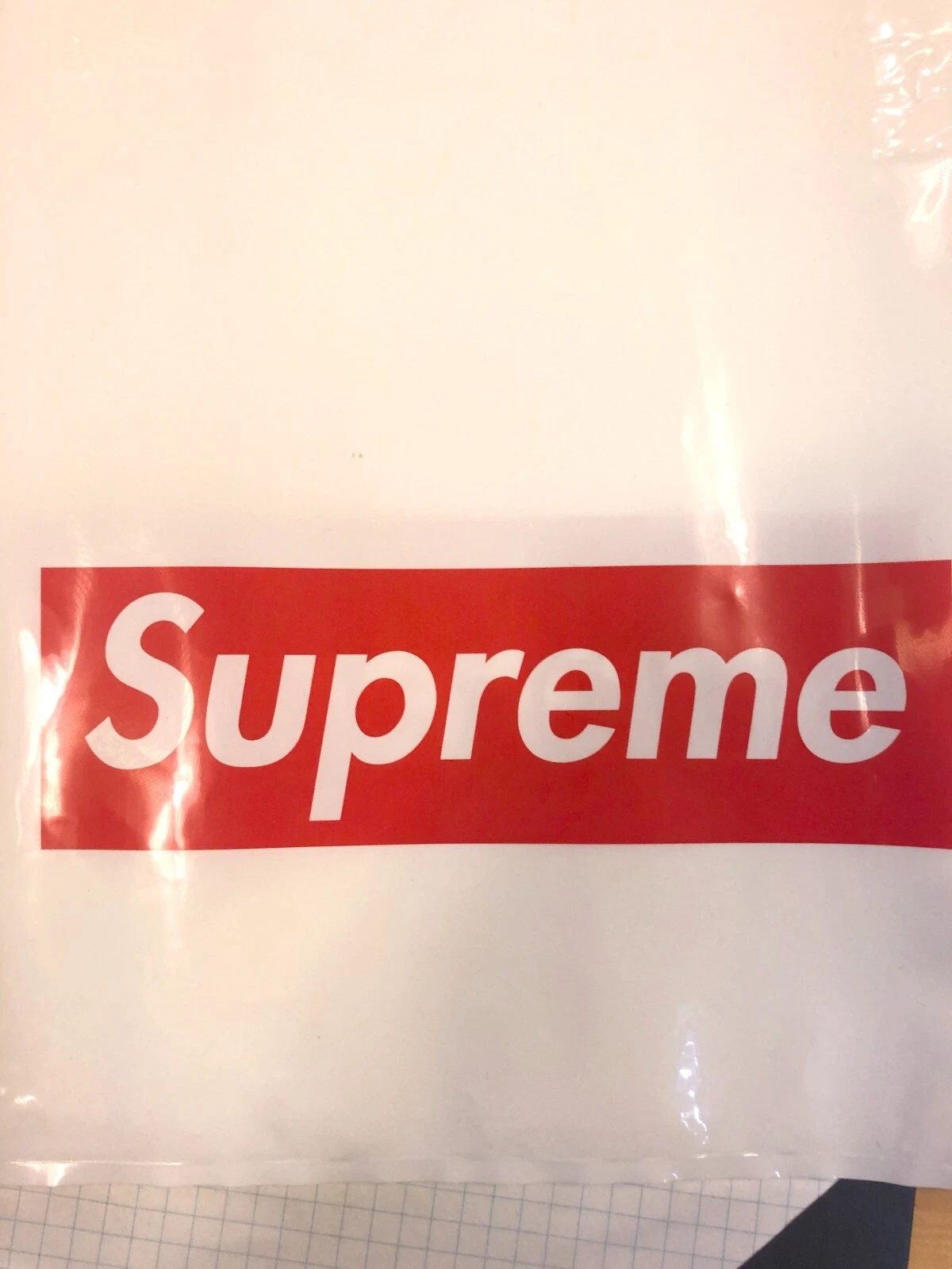 3 sacs à provisions en plastique blanc suprême logo rouge 13