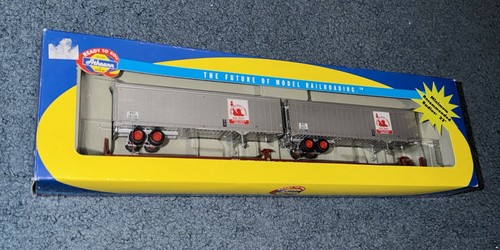 Tren remolque Athearn HO 85’ vagón plano con 2 remolques CNJ 40’ / #92607 | Condition: Used