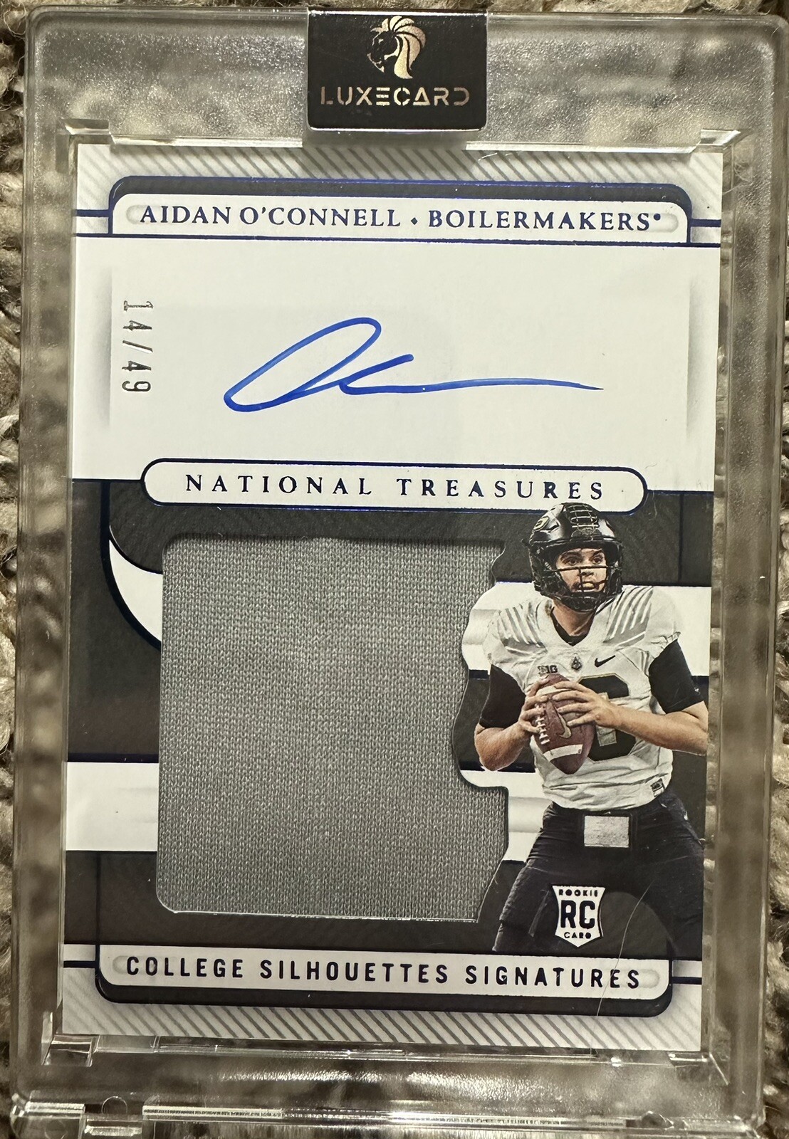 2023 National Treasures Collegiate Aidan O’Connell Rookie Jersey Auto #14/49 
