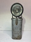 Vintage silver Flashlight Bell System Light-Stick No. 2105-4 by Justrite Mfg. Co. with black metal lens and side label.