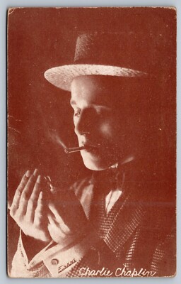 RARE 1920s postcard EXHIBIT SUPPLY CO CHARLIE CHAPLIN LIGHTS CIGARETTE