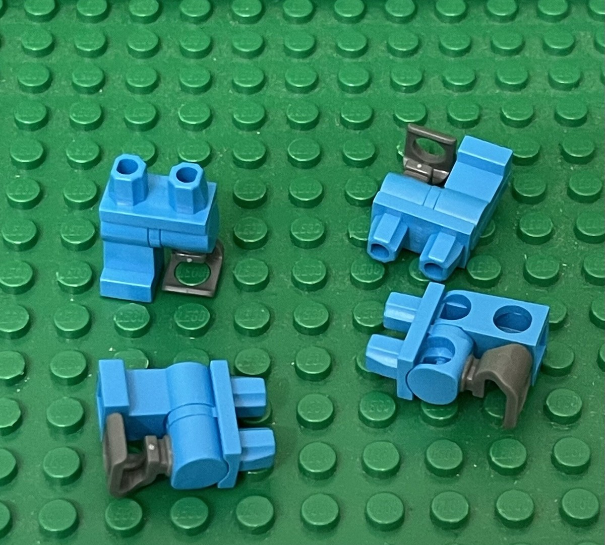 Lego 4 Pieces Dark Azure Right Leg And 1 Dark Bluish Gray Left