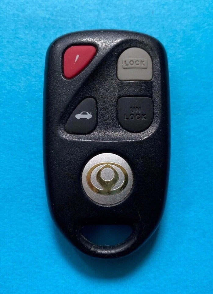 OEM 1995-1999 MAZDA MILLENIA 929 CONTROL REMOTO SIN LLAVE 4 BOTONES KPU41012 ~ ¡COMO NUEVO + LOGOTIPO! Foto 2 de 4