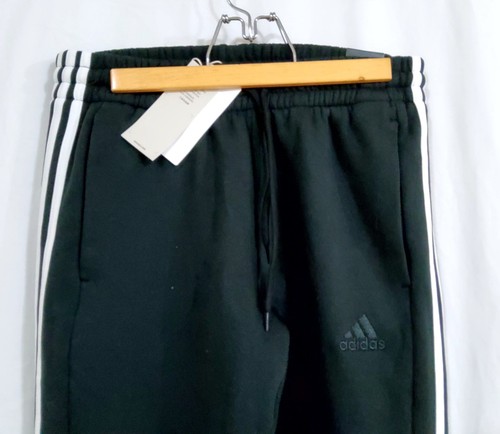 Felpa uomo Adidas gamba affusolata nera 3 righe nuova con etichetta - Taglia M - Foto 2 di 8