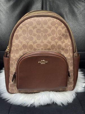 coach furry backpack Charter In Signature Shearling Club de Mode made in soft plush faux fur with stylish black faux leather trims Coach faux leather white wool