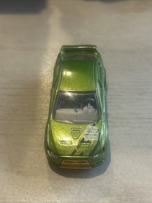 Y2K Hot Wheels 2008 Mitsubishi Lancer Evolution Diecast Car Green 1:64 Gold Base