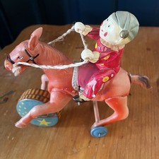 Vintage Celluloid Toy Boy on Horse