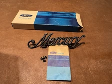 NOS FORD D3MY-6542528-A D3MB-6542528-AA 1973-74 MERCURY MARQUIS TRUNK NAMEPLATE