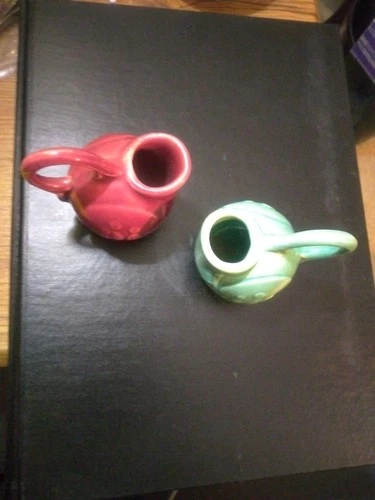 An Adorable Pair Of Vtg McCoy Miniature (2-1/4") Pitchers In mauve and aqua.